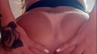 Redhead beauty enjoys solo play with a big dildo