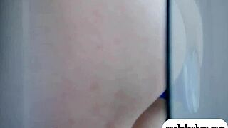 Two gorgeous women pleasure themselves with a blue dildo and each other's tongues