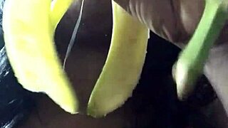 Black beauty gets her banana split in a rather obvious manner