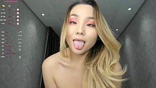 Solo webcam girl playfully fondles her big tits
