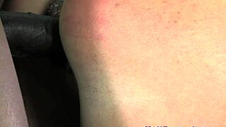 Dominant male punishes submissive woman with anal hook and spanking