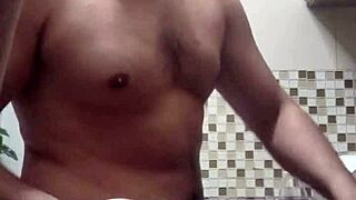 Gay blowjob and fetish fun with a bald man washing dishes
