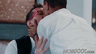 A handsome and intelligent businessman with glasses has a young and hot black gay