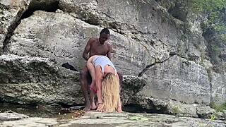 A preview of a Big Daddy interracial couple having sex in the woods