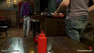 Three female wrestlers in a kinky BDSM threesome in a bar