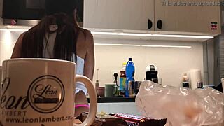 Beautiful amateur wife in tight clothing does house chores while being filmed by a spy camera
