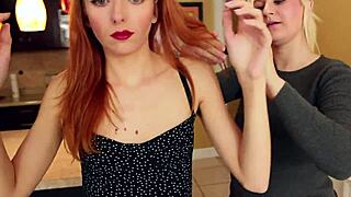Redhead Lizzy Lamb in a freeze fetish scene with a real-life doll