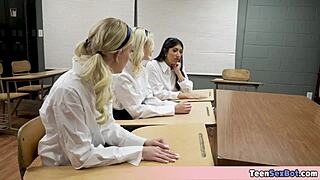 Three petite pupils offer their pussies to the teacher