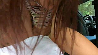 A hot girl has sex in a car outdoors and rides a big cock