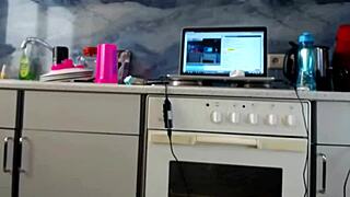 Shaved pussy amateur masturbates in kitchen webcam show