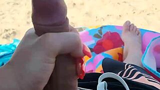 Public beach encounter ends up in a steamy scene