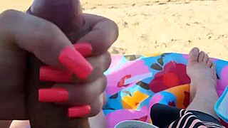 Public beach encounter ends up in a steamy scene