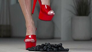 Crushing fruits with bare feet and high heels amateur video