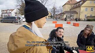 A bisexual couple's wife swap leads to threesome