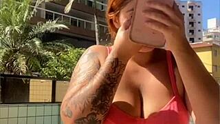 Redhead’s swollen pussy is stimulated live on cam