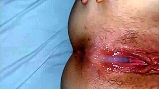 Big natural tits and an Argentine pussy get a facial in this amateur video