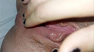 Big natural tits and an Argentine pussy get a facial in this amateur video
