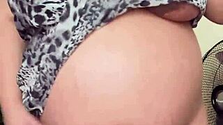 Pregnant maid's solo session with big tits and hairy pussy