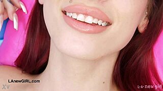 The sexy red-haired model shows her nice body