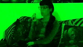 Beth kinky - smoking a cigarette under the green light