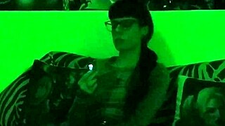 Beth kinky - smoking a cigarette under the green light
