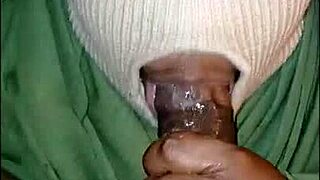 Girl in a mask licks the guy's dick very badly
