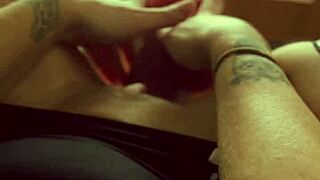 Blonde milf teases with wet pussy play at window, talking dirty