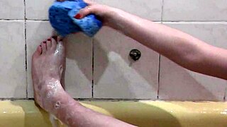 Beautiful Young Girl Bathes with Soapy Foam on Pussy, Boobs, and Feet