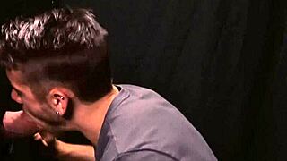 Stepfather enjoys a handjob and blowjob from his stepson in a gloryhole setting