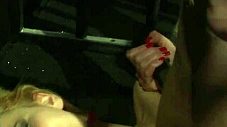 Lezdom babe toys bound sub's wet pussy in latex fetish scene