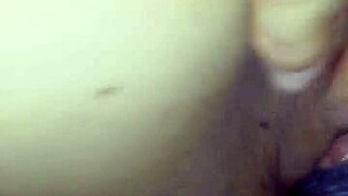 Amateur Crossdressing Couple Engages in Intimate Bedroom Activities