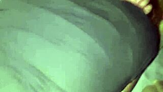 She slides a dildo into her ass for anal fucking.