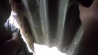 Filipina fucks bent over in public toilet by the river