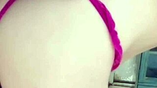 i'm on the balcony with my girlfriend, she's posing all sexy and pulling her panties to play with her wet pussy, then giving a handjob and blowjob with her bare feet