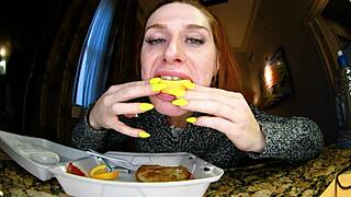 redhead moaning while licking french toast close up