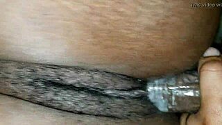 Black cock cums inside the condom in a car