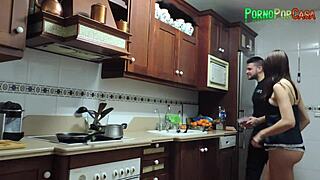 Busty brunette gets pounded between kitchen stoves with friend