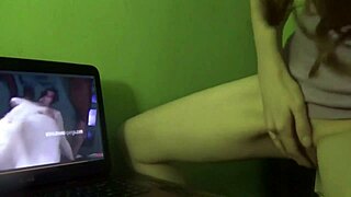 Redhead milf achieves dry humping orgasm while watching porn at home