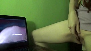 Redhead milf achieves dry humping orgasm while watching porn at home