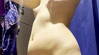 Hidden camera catches young latina exposing tits in department store fitting room!