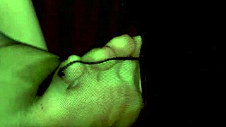 yo, why's this slave in a gimp mask sucking a strap-on cock?