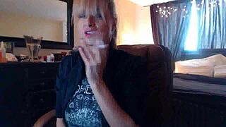 hey, watch sandi smoking those brown cork cigarettes while squirting?