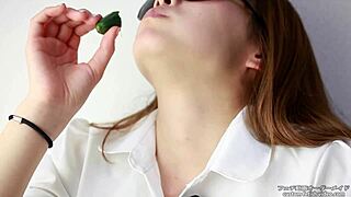 Asian Women Make Sounds While Eating Cucumber in Fetish Video