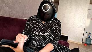 After the Squid Game, I jerked off a member until he exploded on my big tits.