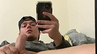 Blonde frat guy admires himself in the mirror