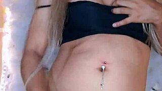 I admire this hermosa travesti gently touching the polla with care.