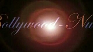 Brunette nude dancer teases by showing off her body gracefully.