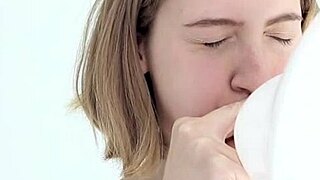 young looner babe blowing and popping her first balloon