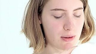 young looner babe blowing and popping her first balloon