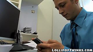 Two twinks get naughty in the office